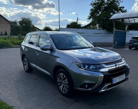 Серый Мицубиси Аутлендер, объемом двигателя 2.4 л и пробегом 139 тыс. км за 18900 $, фото 2 на Automoto.ua