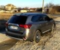 Серый Мицубиси Аутлендер, объемом двигателя 2.4 л и пробегом 125 тыс. км за 17200 $, фото 3 на Automoto.ua
