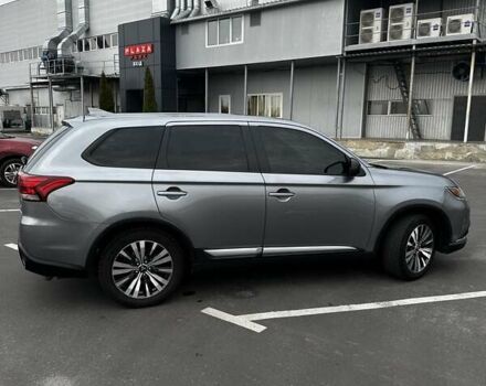 Сірий Міцубісі Аутлендер, об'ємом двигуна 2.36 л та пробігом 135 тис. км за 15000 $, фото 8 на Automoto.ua