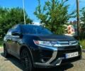 Серый Мицубиси Аутлендер, объемом двигателя 2.36 л и пробегом 88 тыс. км за 18000 $, фото 1 на Automoto.ua