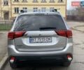 Сірий Міцубісі Аутлендер, об'ємом двигуна 2.36 л та пробігом 38 тис. км за 17800 $, фото 3 на Automoto.ua