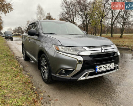 Серый Мицубиси Аутлендер, объемом двигателя 2.36 л и пробегом 150 тыс. км за 13500 $, фото 2 на Automoto.ua