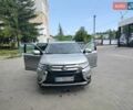 Серый Мицубиси Аутлендер, объемом двигателя 2.36 л и пробегом 95 тыс. км за 15999 $, фото 5 на Automoto.ua
