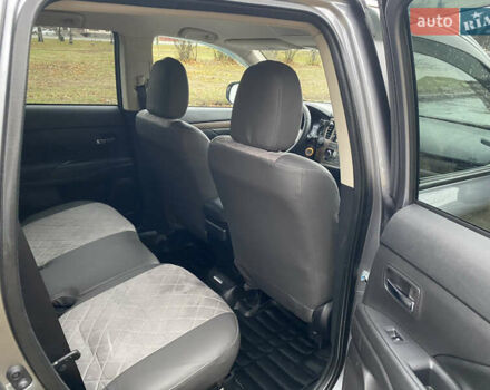 Серый Мицубиси Аутлендер, объемом двигателя 2.36 л и пробегом 150 тыс. км за 13500 $, фото 10 на Automoto.ua