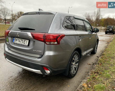 Серый Мицубиси Аутлендер, объемом двигателя 2.36 л и пробегом 150 тыс. км за 13500 $, фото 7 на Automoto.ua