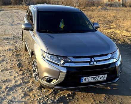 Серый Мицубиси Аутлендер, объемом двигателя 2.4 л и пробегом 125 тыс. км за 17200 $, фото 1 на Automoto.ua