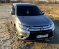 Серый Мицубиси Аутлендер, объемом двигателя 2.4 л и пробегом 125 тыс. км за 17200 $, фото 1 на Automoto.ua