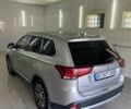 Серый Мицубиси Аутлендер, объемом двигателя 2.35 л и пробегом 83 тыс. км за 15999 $, фото 3 на Automoto.ua