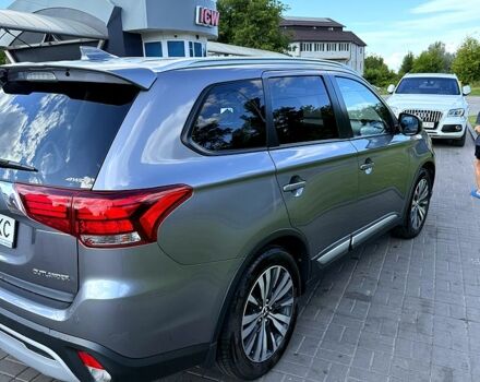 Серый Мицубиси Аутлендер, объемом двигателя 2.4 л и пробегом 139 тыс. км за 18900 $, фото 3 на Automoto.ua