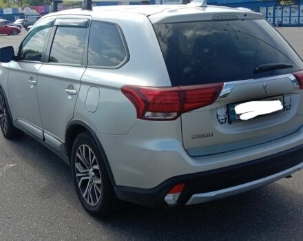 Серый Мицубиси Аутлендер, объемом двигателя 2.4 л и пробегом 100 тыс. км за 17700 $, фото 2 на Automoto.ua