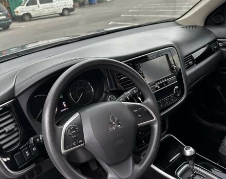 Сірий Міцубісі Аутлендер, об'ємом двигуна 2.36 л та пробігом 135 тис. км за 15000 $, фото 9 на Automoto.ua