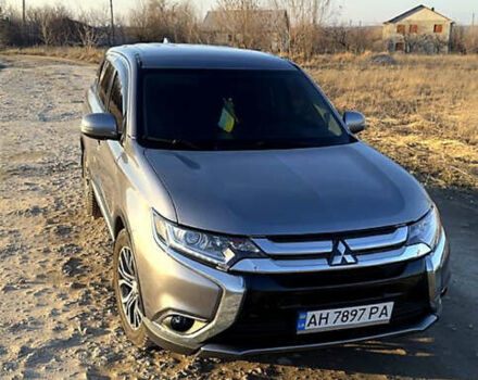 Серый Мицубиси Аутлендер, объемом двигателя 2.36 л и пробегом 131 тыс. км за 16300 $, фото 1 на Automoto.ua