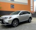 Серый Мицубиси Аутлендер, объемом двигателя 2.4 л и пробегом 193 тыс. км за 14500 $, фото 1 на Automoto.ua