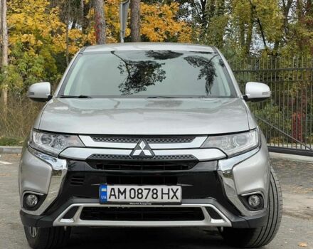 Серый Мицубиси Аутлендер, объемом двигателя 2.4 л и пробегом 110 тыс. км за 15950 $, фото 1 на Automoto.ua