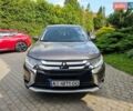 Серый Мицубиси Аутлендер, объемом двигателя 2.36 л и пробегом 65 тыс. км за 16500 $, фото 1 на Automoto.ua
