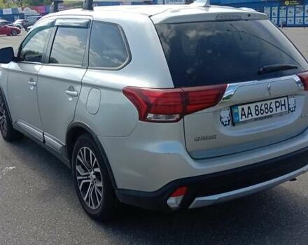 Сірий Міцубісі Аутлендер, об'ємом двигуна 2.36 л та пробігом 100 тис. км за 17700 $, фото 4 на Automoto.ua