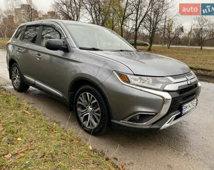 Серый Мицубиси Аутлендер, объемом двигателя 2.36 л и пробегом 150 тыс. км за 13500 $, фото 6 на Automoto.ua