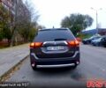 Серый Мицубиси Аутлендер, объемом двигателя 2.4 л и пробегом 135 тыс. км за 16999 $, фото 1 на Automoto.ua