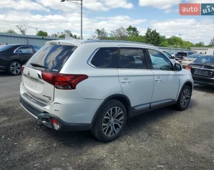 Серый Мицубиси Аутлендер, объемом двигателя 2.36 л и пробегом 107 тыс. км за 3000 $, фото 2 на Automoto.ua