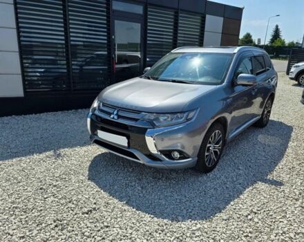 Серый Мицубиси Аутлендер, объемом двигателя 2.4 л и пробегом 89 тыс. км за 9900 $, фото 1 на Automoto.ua