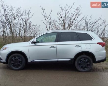 Серый Мицубиси Аутлендер, объемом двигателя 2.36 л и пробегом 101 тыс. км за 16400 $, фото 3 на Automoto.ua