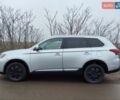 Серый Мицубиси Аутлендер, объемом двигателя 2.36 л и пробегом 101 тыс. км за 16400 $, фото 3 на Automoto.ua