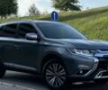 Сірий Міцубісі Аутлендер, об'ємом двигуна 2.4 л та пробігом 138 тис. км за 11500 $, фото 1 на Automoto.ua