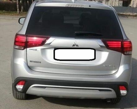 Серый Мицубиси Аутлендер, объемом двигателя 2.4 л и пробегом 91 тыс. км за 10599 $, фото 3 на Automoto.ua