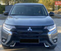 Серый Мицубиси Аутлендер, объемом двигателя 2.4 л и пробегом 133 тыс. км за 16000 $, фото 1 на Automoto.ua