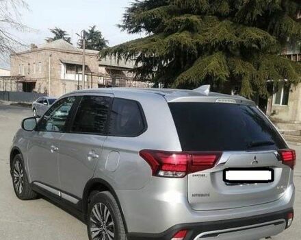 Серый Мицубиси Аутлендер, объемом двигателя 2.4 л и пробегом 91 тыс. км за 10599 $, фото 2 на Automoto.ua
