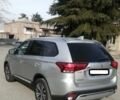Серый Мицубиси Аутлендер, объемом двигателя 2.4 л и пробегом 91 тыс. км за 10599 $, фото 2 на Automoto.ua