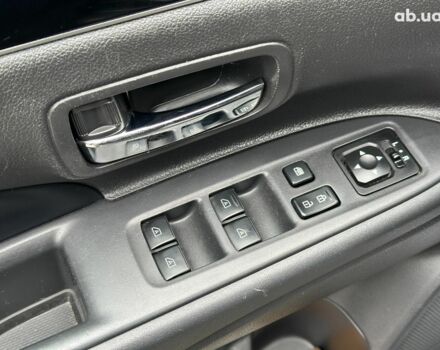 Серый Мицубиси Аутлендер, объемом двигателя 2.4 л и пробегом 131 тыс. км за 17440 $, фото 20 на Automoto.ua