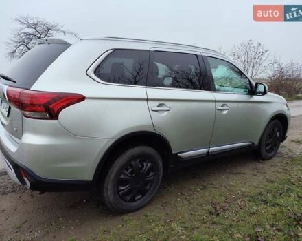 Серый Мицубиси Аутлендер, объемом двигателя 2.36 л и пробегом 101 тыс. км за 16400 $, фото 4 на Automoto.ua