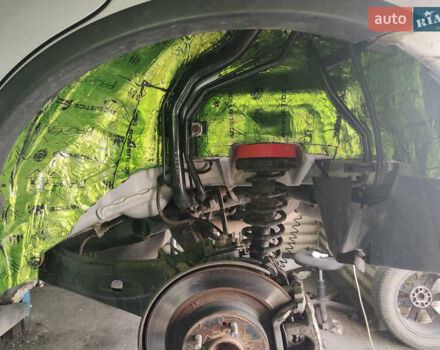 Серый Мицубиси Аутлендер, объемом двигателя 2.36 л и пробегом 135 тыс. км за 19200 $, фото 4 на Automoto.ua