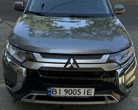 Серый Мицубиси Аутлендер, объемом двигателя 2 л и пробегом 140 тыс. км за 19700 $, фото 4 на Automoto.ua