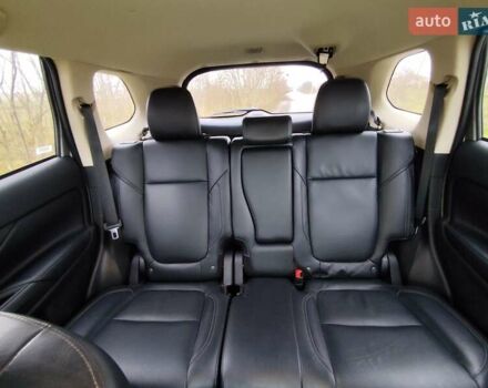 Серый Мицубиси Аутлендер, объемом двигателя 2.36 л и пробегом 101 тыс. км за 16400 $, фото 9 на Automoto.ua