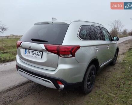 Серый Мицубиси Аутлендер, объемом двигателя 2.36 л и пробегом 101 тыс. км за 16400 $, фото 6 на Automoto.ua