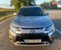 Серый Мицубиси Аутлендер, объемом двигателя 2.36 л и пробегом 104 тыс. км за 16700 $, фото 1 на Automoto.ua
