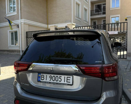 Серый Мицубиси Аутлендер, объемом двигателя 2 л и пробегом 140 тыс. км за 19700 $, фото 1 на Automoto.ua