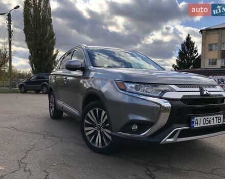 Серый Мицубиси Аутлендер, объемом двигателя 2.36 л и пробегом 155 тыс. км за 17500 $, фото 2 на Automoto.ua