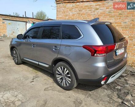 Серый Мицубиси Аутлендер, объемом двигателя 2.36 л и пробегом 125 тыс. км за 15500 $, фото 3 на Automoto.ua