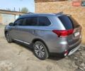 Серый Мицубиси Аутлендер, объемом двигателя 2.36 л и пробегом 125 тыс. км за 15500 $, фото 3 на Automoto.ua