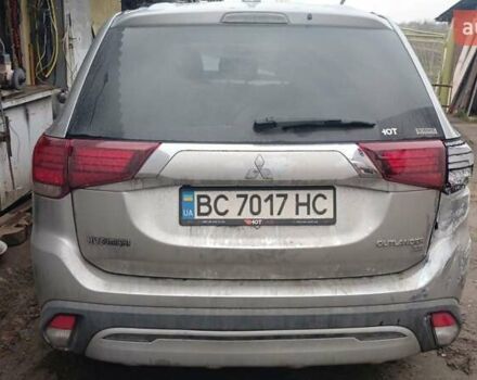 Серый Мицубиси Аутлендер, объемом двигателя 2.35 л и пробегом 100 тыс. км за 5500 $, фото 3 на Automoto.ua