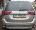 Серый Мицубиси Аутлендер, объемом двигателя 2.35 л и пробегом 100 тыс. км за 5500 $, фото 3 на Automoto.ua