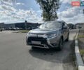 Серый Мицубиси Аутлендер, объемом двигателя 2.36 л и пробегом 160 тыс. км за 16200 $, фото 1 на Automoto.ua