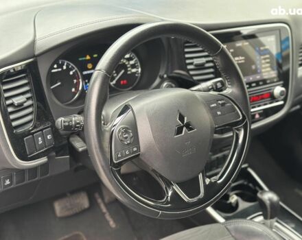 Серый Мицубиси Аутлендер, объемом двигателя 2.4 л и пробегом 131 тыс. км за 17440 $, фото 18 на Automoto.ua