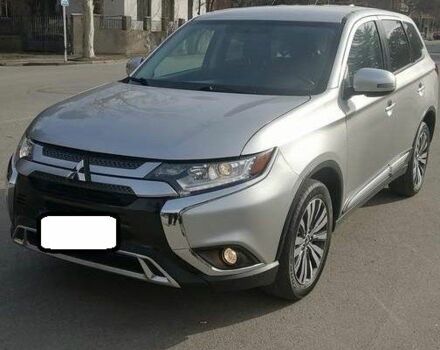 Серый Мицубиси Аутлендер, объемом двигателя 2.4 л и пробегом 91 тыс. км за 10599 $, фото 4 на Automoto.ua