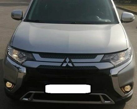 Серый Мицубиси Аутлендер, объемом двигателя 2.4 л и пробегом 91 тыс. км за 10599 $, фото 1 на Automoto.ua