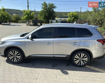 Серый Мицубиси Аутлендер, объемом двигателя 2.36 л и пробегом 123 тыс. км за 22000 $, фото 2 на Automoto.ua