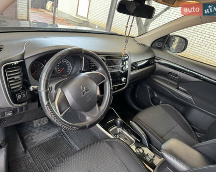 Серый Мицубиси Аутлендер, объемом двигателя 2 л и пробегом 137 тыс. км за 16500 $, фото 12 на Automoto.ua